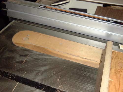 Tablesaw blade lowered for protection.